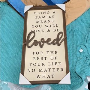 Decorative  sign still in packaging.